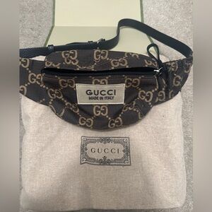 GUCCI. LARGE GG RIPSTOP BELT BAG